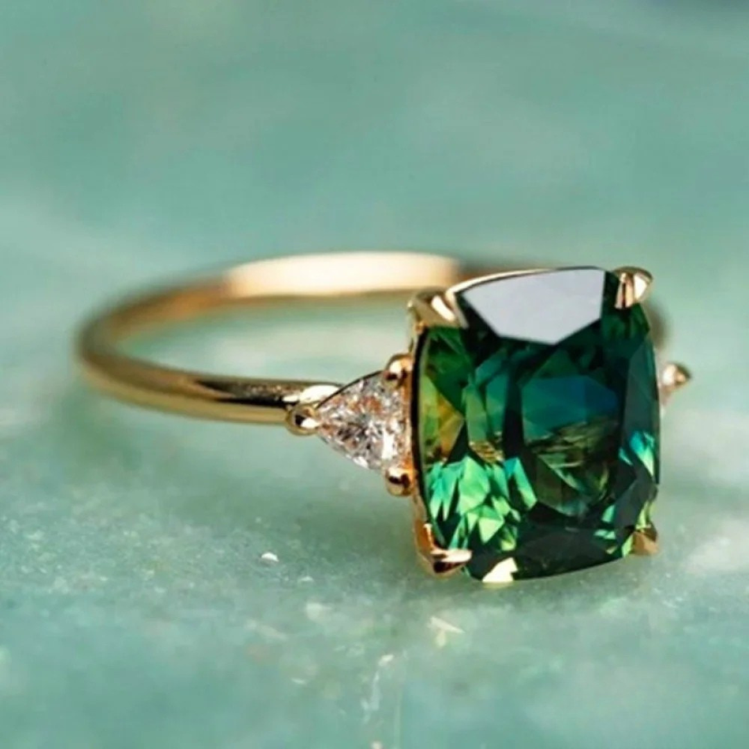 Green zircon ring in gold